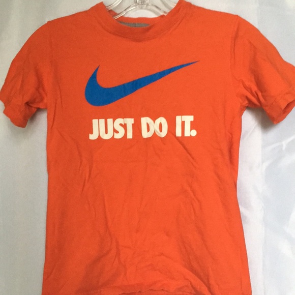 red and orange nike shirt